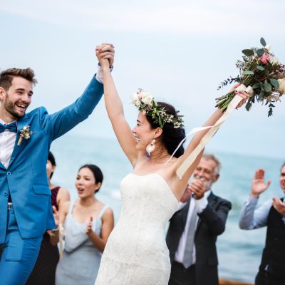 Young couple in a wedding ceremony at the beach